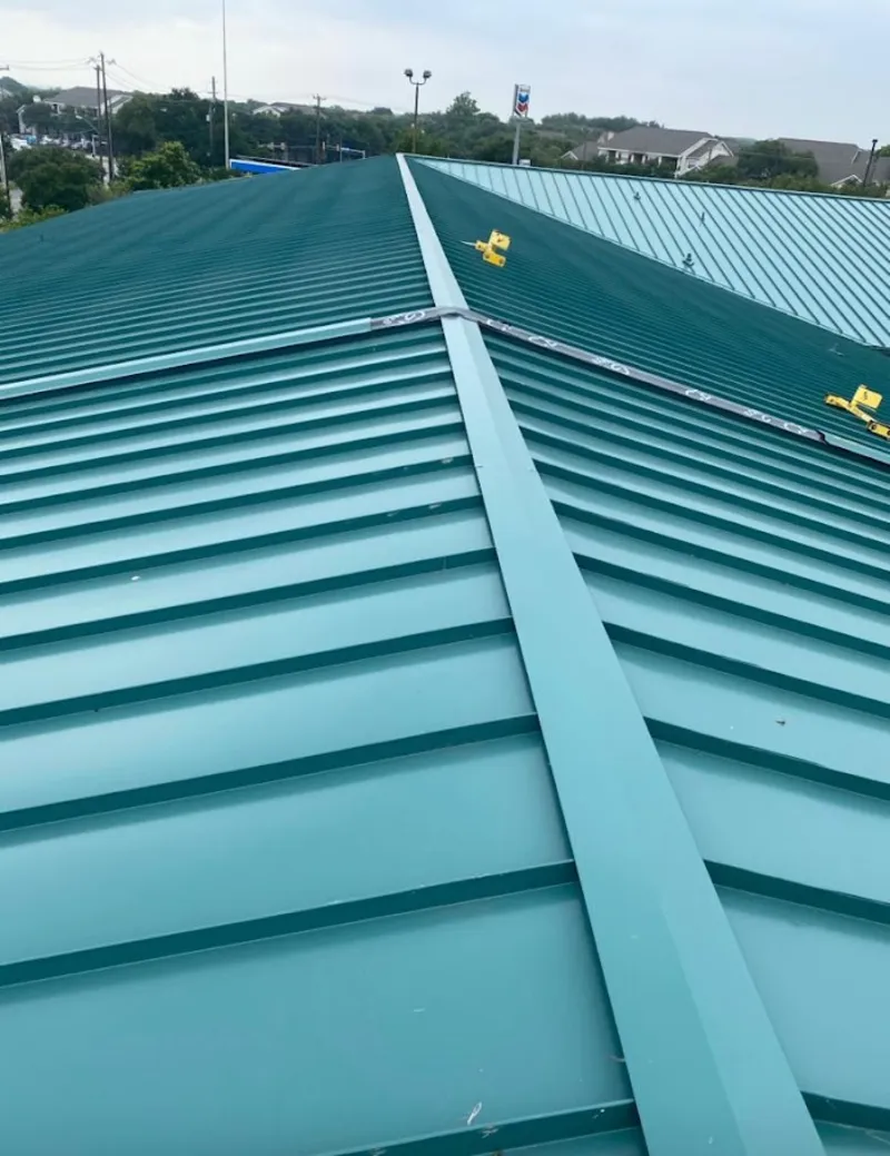 Green commercial metal roof ridge and valley for Metal Roof Repair in South Weber