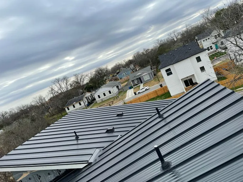 Standing seam metal roof panels with vents for Skylight Repair in South Weber